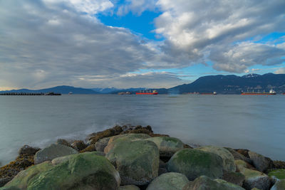 Scenic view of bay against sky