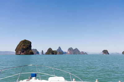 Panoramic view of sea against clear blue sky