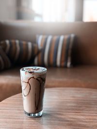 Close-up of coffee cup on table