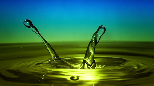 Close-up of drop on water