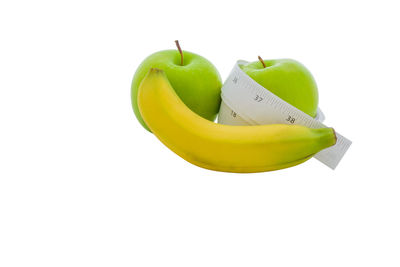 High angle view of fruits against white background