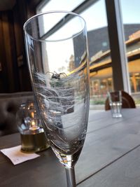 Close-up of wine glass on table in restaurant