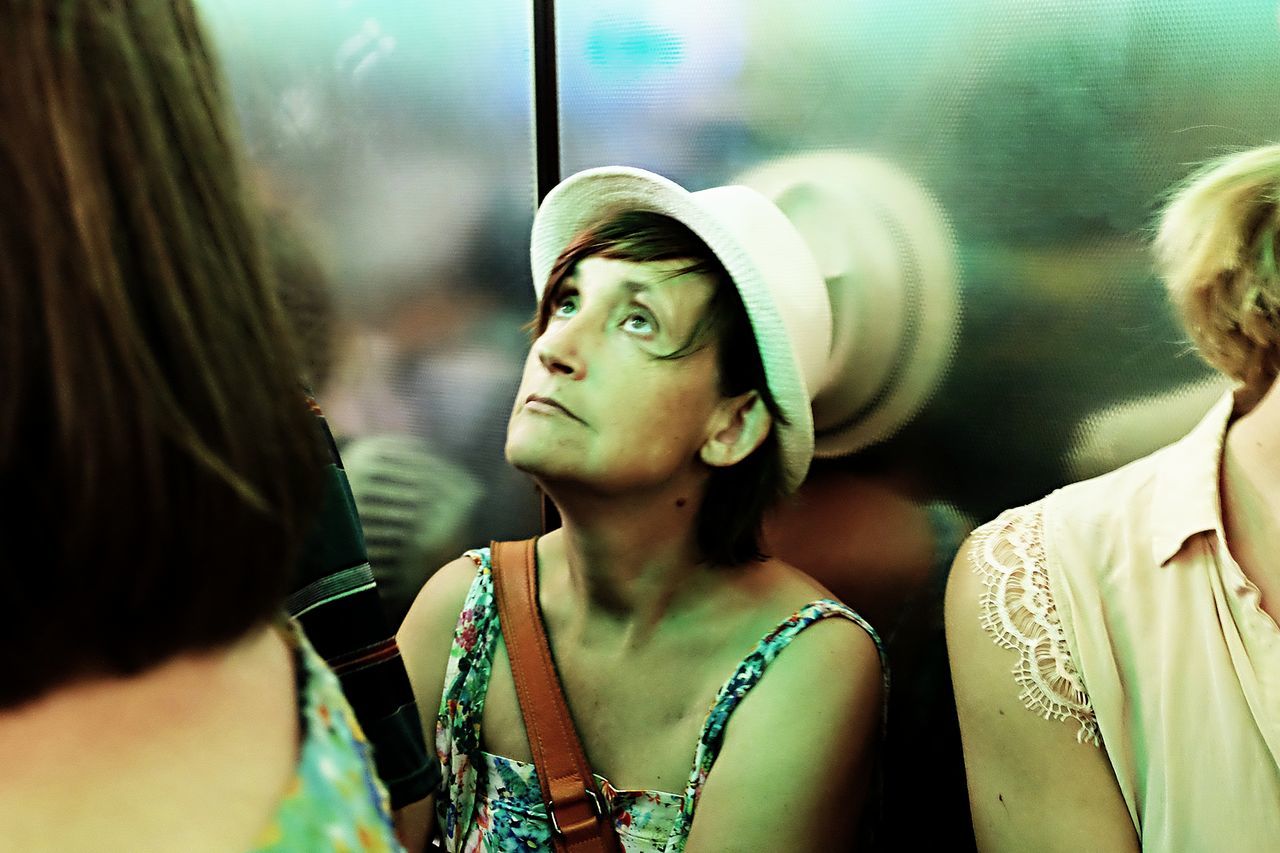 PORTRAIT OF YOUNG WOMAN WITH REFLECTION