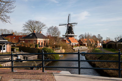 The old mill with the name 'dutch prosperity' in the  village of mensingeweer, province of groningen