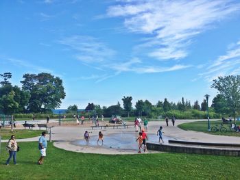 People relaxing in park