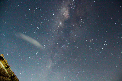 Low angle view of stars against sky at night