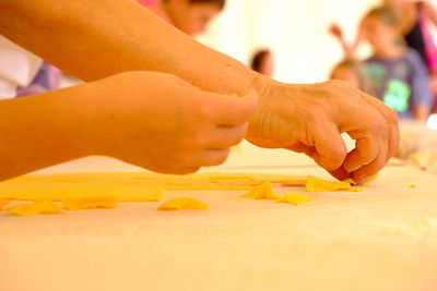 Close-up of person preparing food