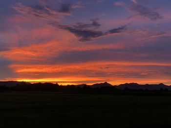 Scenic view of dramatic sky during sunset