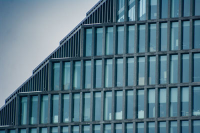 Low angle view of modern building against clear sky