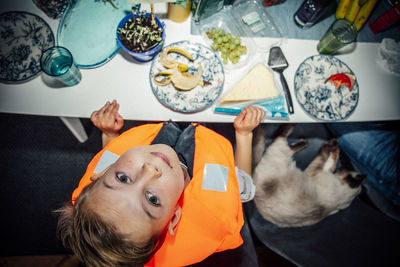Directly above shot of boy at table
