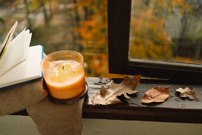 Candle and autumn decor. autumn home decor. cozy fall mood.