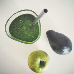 High angle view of green fruits on table