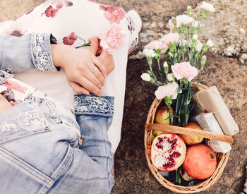 High angle view of woman holding bouquet