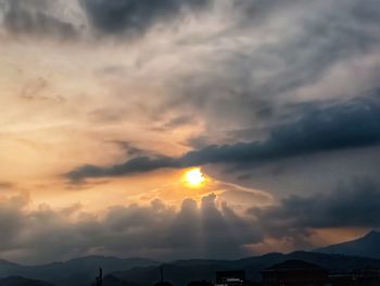 Scenic view of dramatic sky during sunset