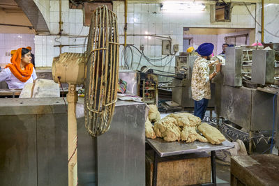 People working in factory