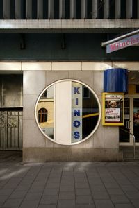 Information sign on wall of building