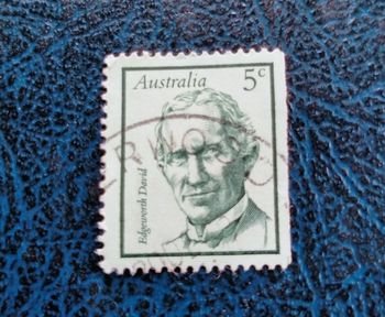 Close-up of paper against blue background