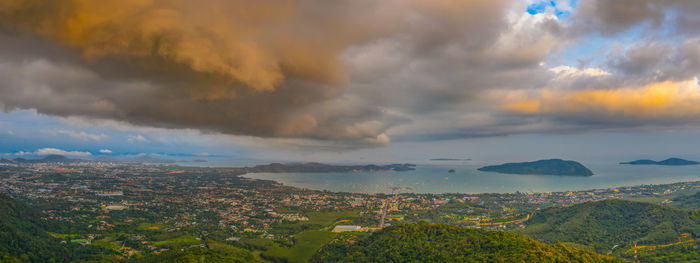 Panoramic view of landscape against dramatic sky