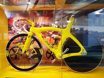 Yellow bicycle in city