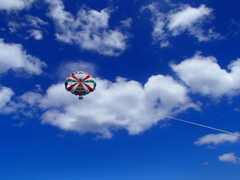 Low angle view of kite flying in sky