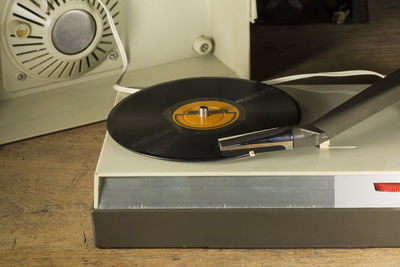 Close-up of electric lamp on table