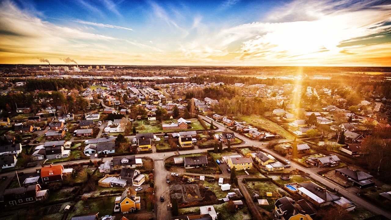 cityscape, architecture, built structure, city, building exterior, high angle view, sunset, sky, cloud - sky, crowded, aerial view, residential district, sunlight, landscape, outdoors, city life, no people, cloud, orange color, nature