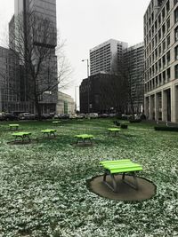 Park in city against clear sky