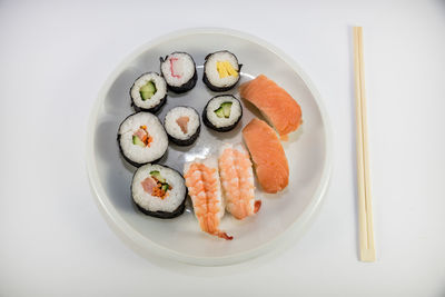 Directly above shot of sushi served in plate