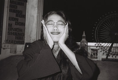 Portrait of beautiful woman at night