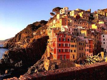 View of illuminated city at sunset