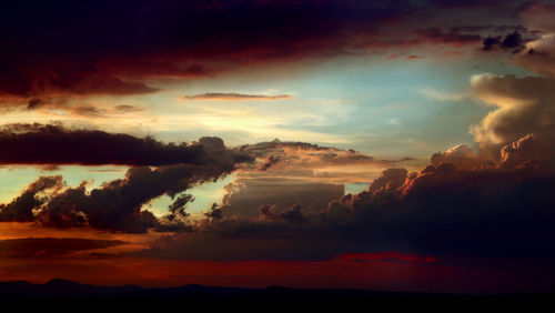 Scenic view of dramatic sky during sunset