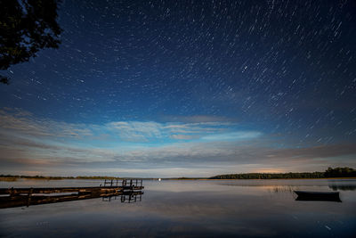 Scenic view of sea against sky at night