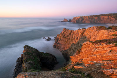 Scenic view of sea against sky during sunset