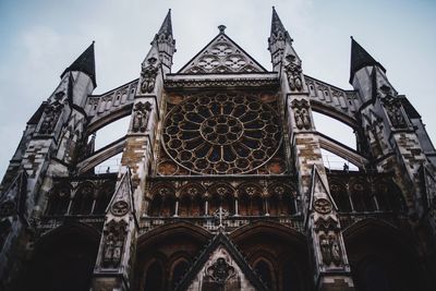 Low angle view of westminster abbey against sky