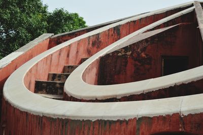 Low angle view of spiral staircase against sky