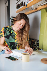 Woman traveling in camper van