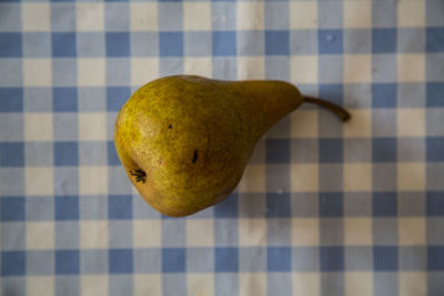 Close-up of pear on table