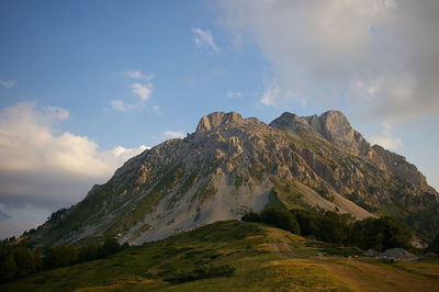 Scenic view of rocky mountains against sky