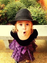 Portrait of cute girl in hat