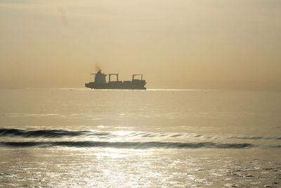 Scenic view of sea at sunset