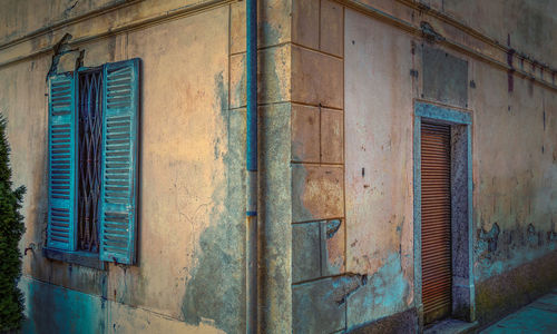 Low angle view of window of old building