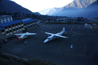 High angle view of airplane flying in sky