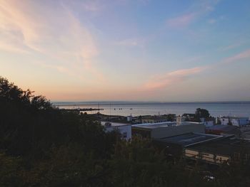 Scenic view of sea against sky at sunset