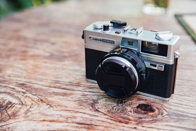 Close-up of camera on table