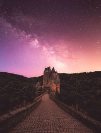 Scenic view of building against sky at night