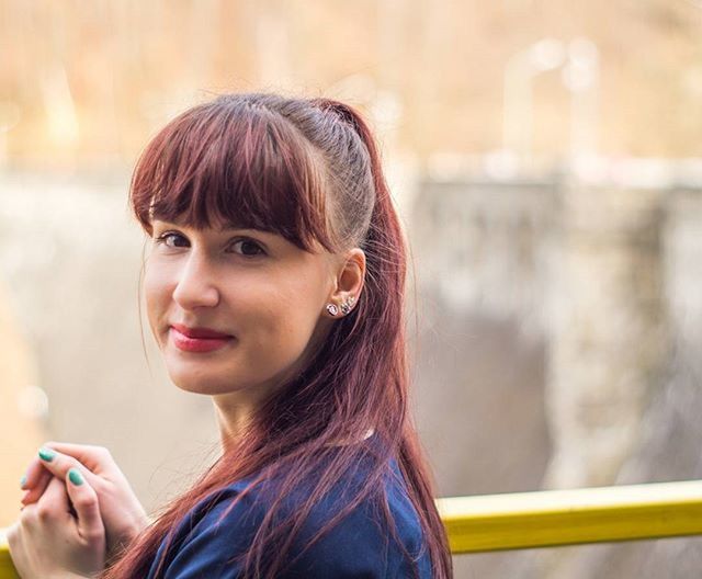 focus on foreground, lifestyles, person, headshot, leisure activity, smiling, casual clothing, looking at camera, childhood, elementary age, portrait, long hair, front view, waist up, girls, close-up, happiness, head and shoulders