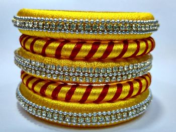 Close-up of colored object over white background