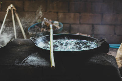 Close-up of food preparing on fire pit