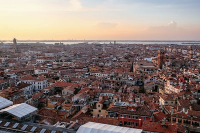 High angle view of townscape against sky at sunset