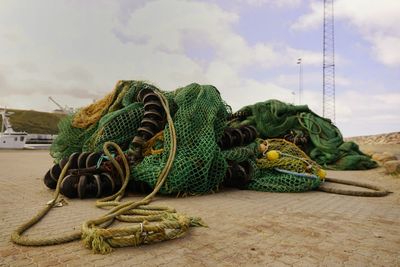 Fishing net on road at harbor